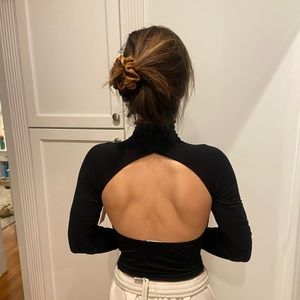 Black backless turtle neck top